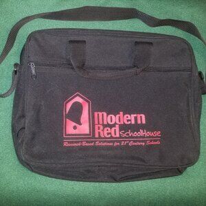 large black bag with straps, and ink-stained interior
